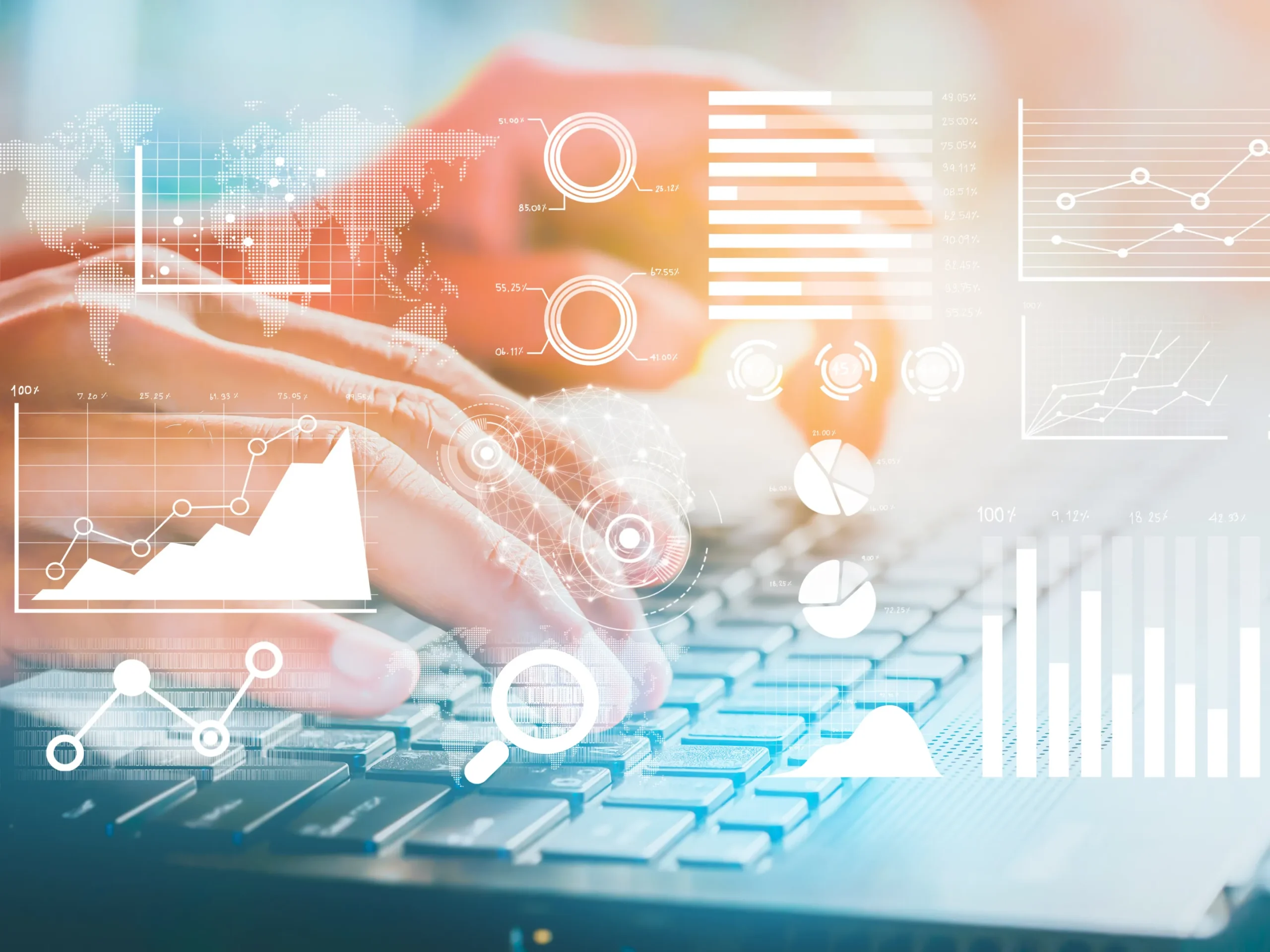 hand typing on keyboard with analytics graphics