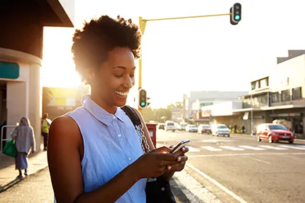 woman looking at her phone